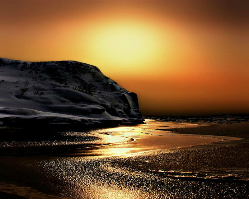 Snow-covered Cliff at Sunset — Orange, Dramatic