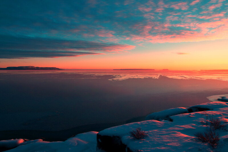 Snow-covered Cliff at Sunset