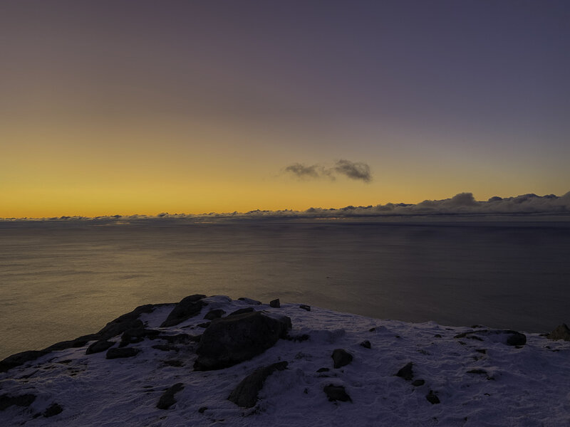 Snow-covered Cliff at Sunset — Yellow