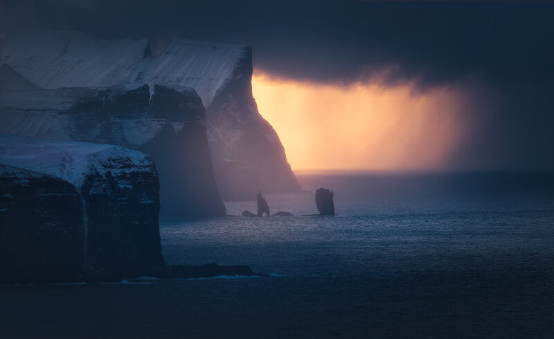 Snow-covered Cliffs at Sunset — Blue, Dramatic
