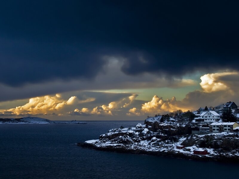 Snow-covered Coastal Village — Blue