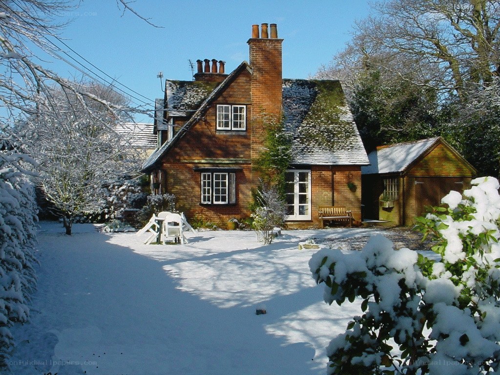 Snow-covered cottage in winter