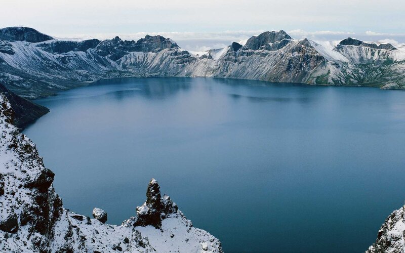 Snow-covered Crater Lake — Blue, Serene