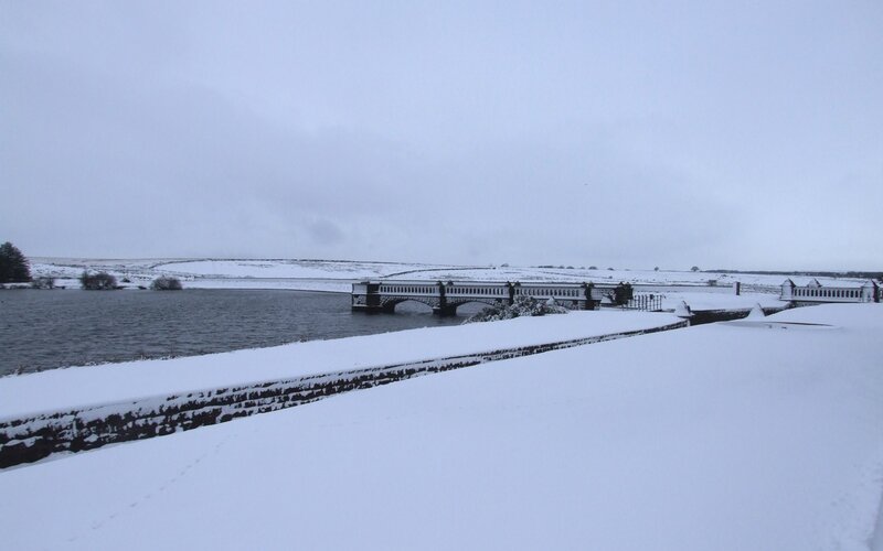 snow-covered dam in winter