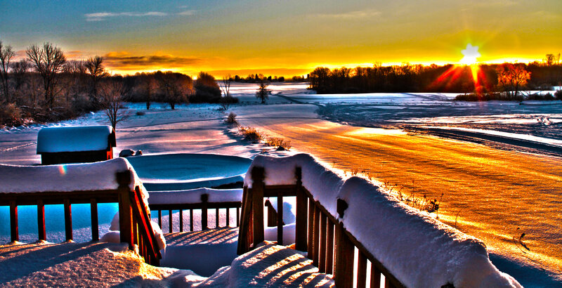 Snow-covered Deck at Sunset
