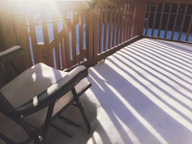 Snow-covered Deck Chair
