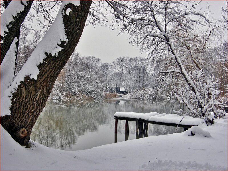 Snow-covered Dock by Lake