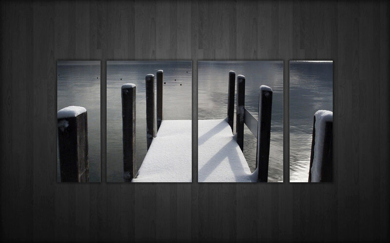 snow-covered dock by the water