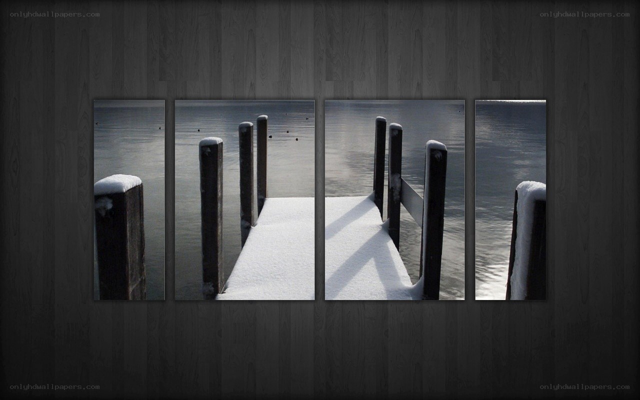 snow-covered dock by the water