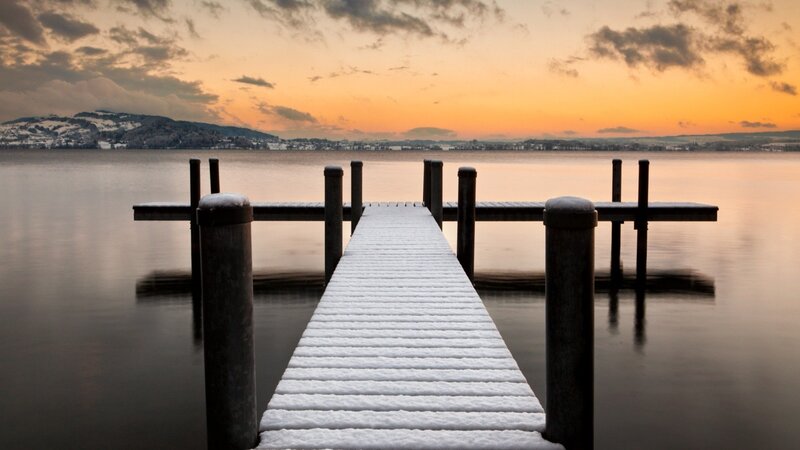 Snow-covered Dock — Orange, Serene, Sunset