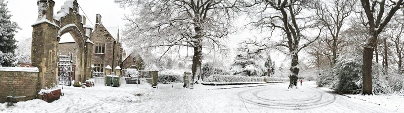 Snow-covered Estate Entrance