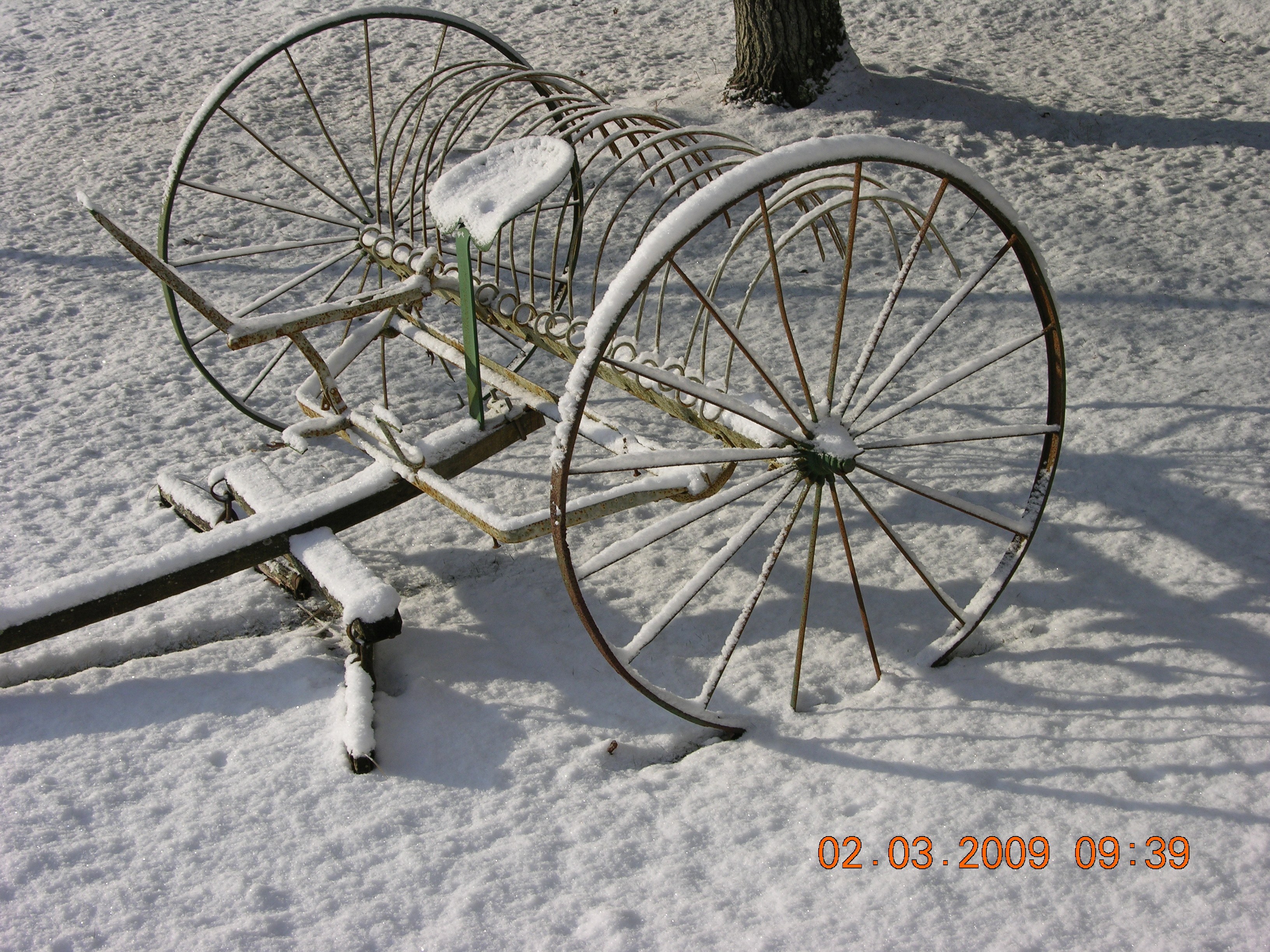 Snow-covered farm equipment