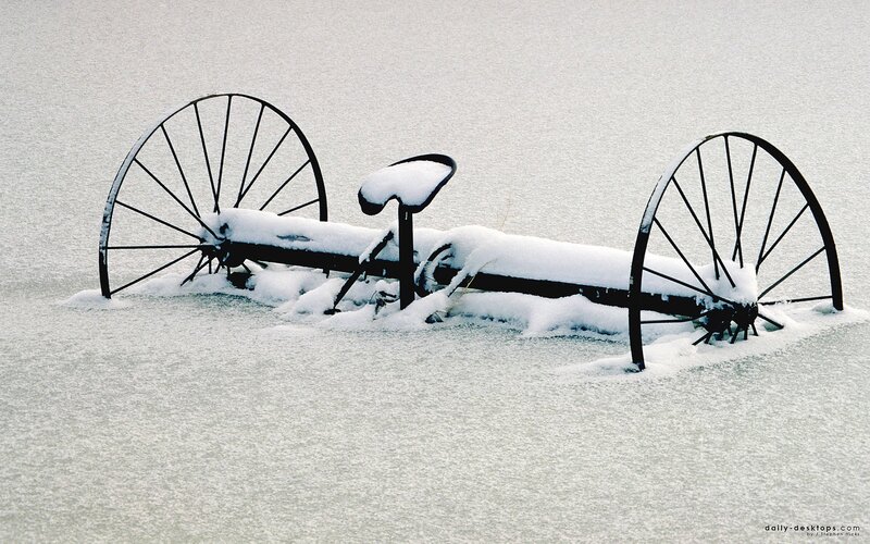 Snow-covered Farm Implement