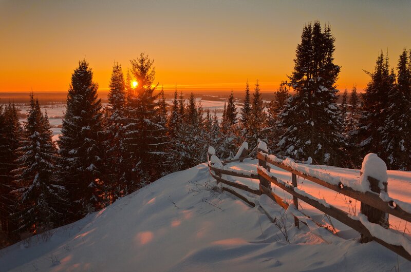 Snow-covered Fence at Sunset — Orange