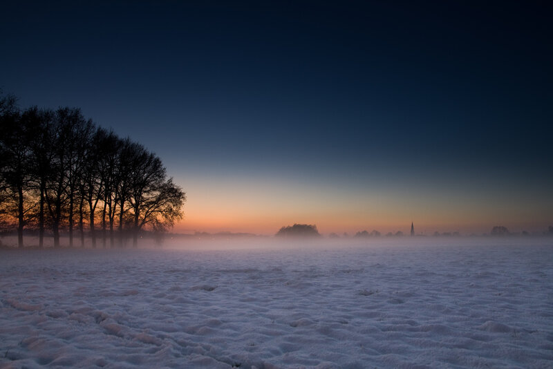 Snow-covered Field at Dawn