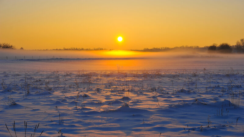 Snow-covered Field at Sunrise — Yellow, Serene, Winter