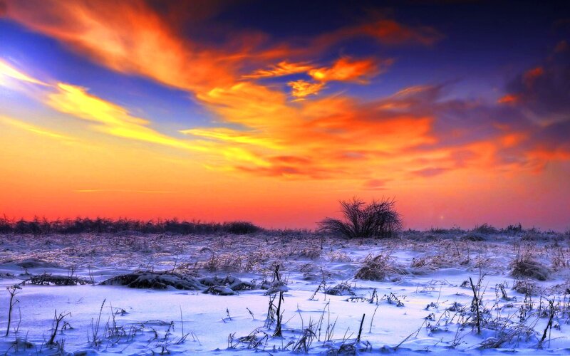 Snow-covered Field at Sunset — Orange, Dramatic, Winter