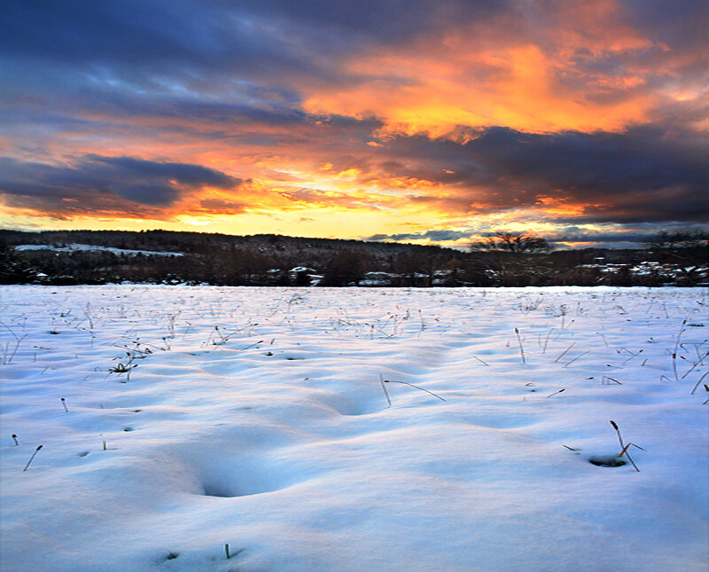 Snow-covered Field at Sunset — Orange