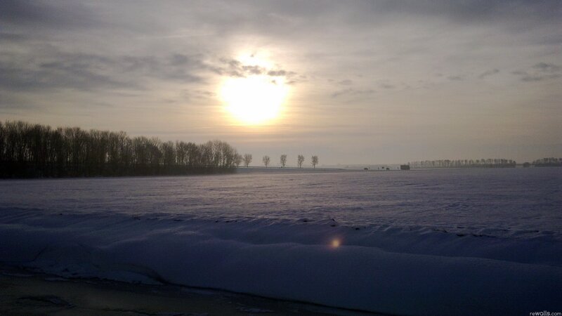 Snow-covered Field at Sunset — White, Serene, Winter