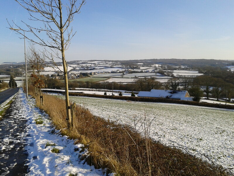 Snow-covered Fields and Village