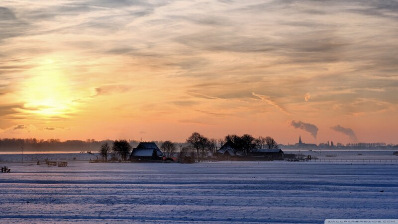 Snow-covered Fields at Sunset