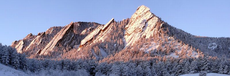 Snow-covered Flatirons at sunrise