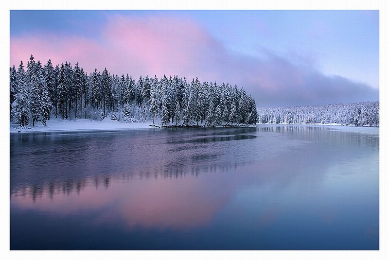 Snow-covered Forest Lake