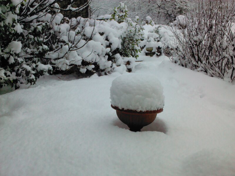 Snow-covered Garden Ornament