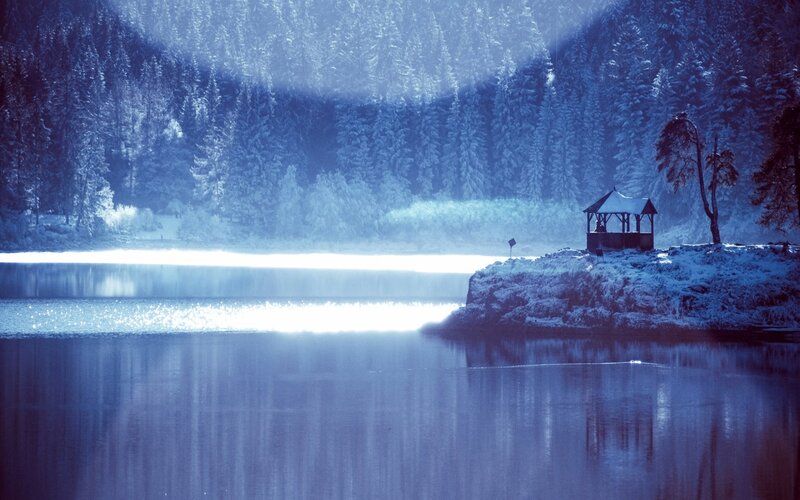 Snow-covered Gazebo by Lake