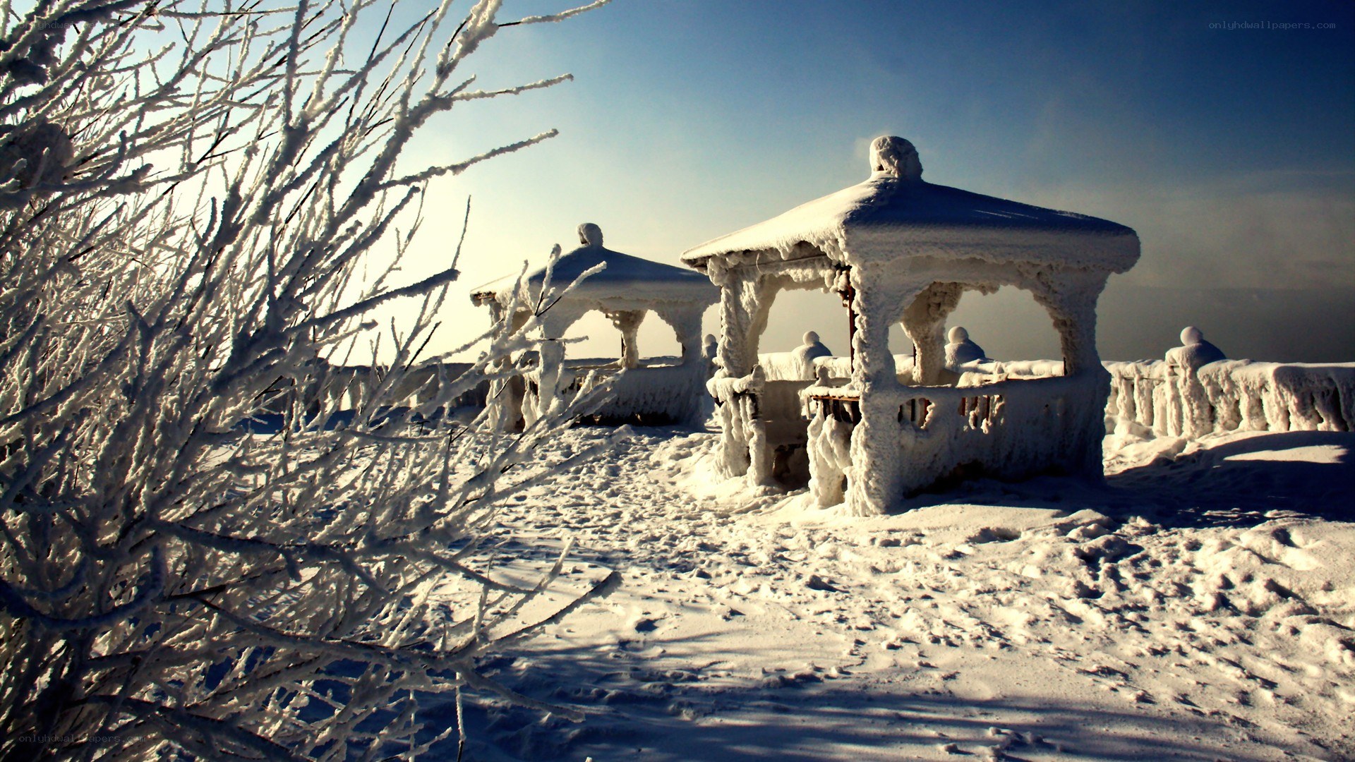 Snow-covered gazebo in winter