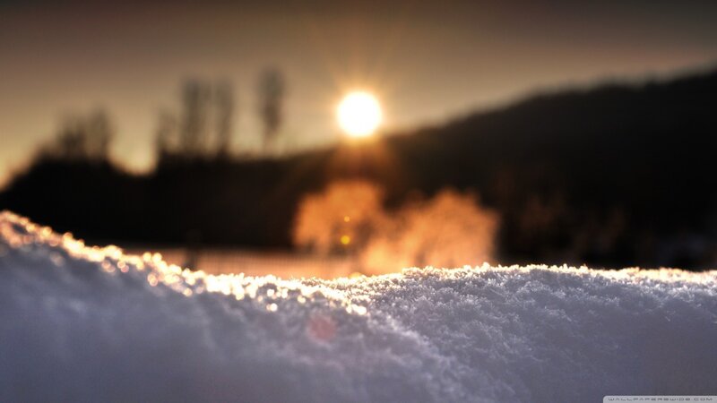Snow-covered Ground at Sunset