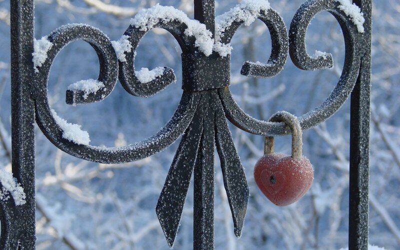 Snow-covered heart lock