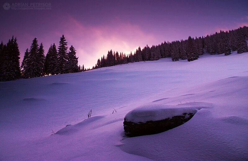 Snow-covered Hill at Dusk