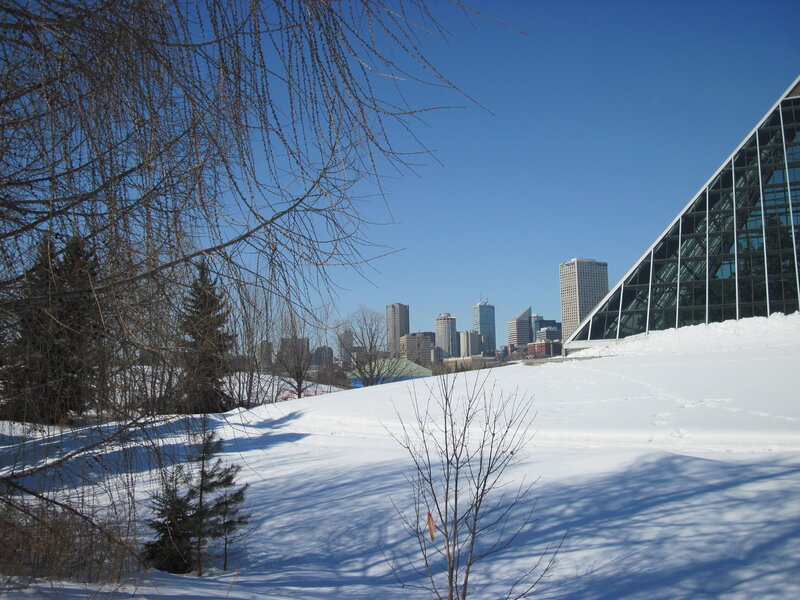 Snow-covered Hill with City