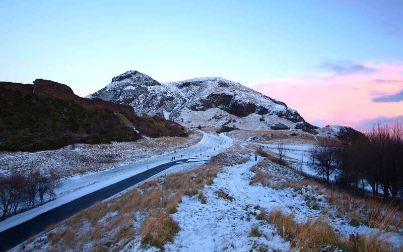 Snow-covered Hill with Road