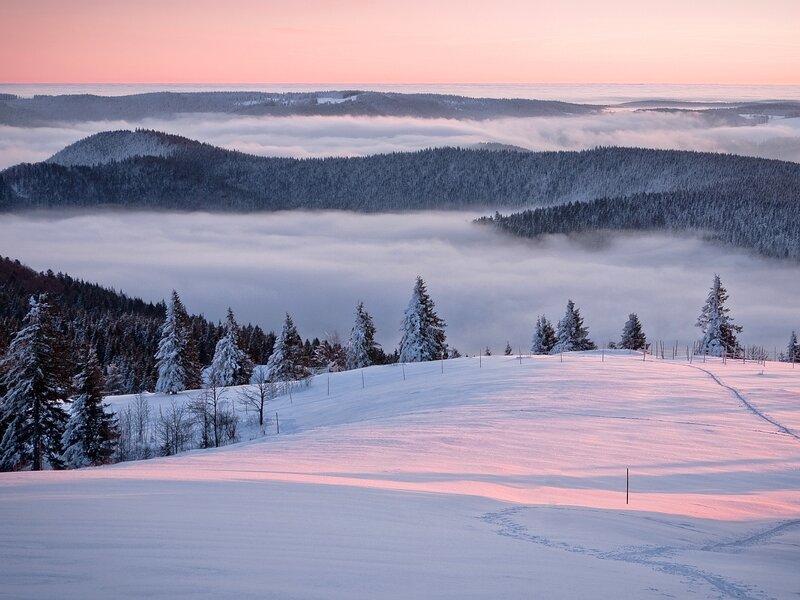 Snow-covered Hills at Dawn