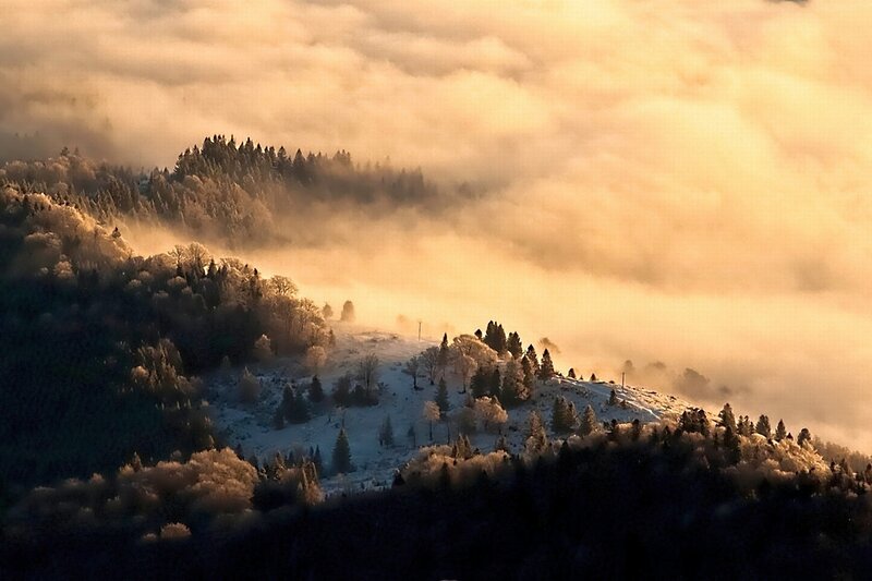 Snow-covered Hills at Sunrise