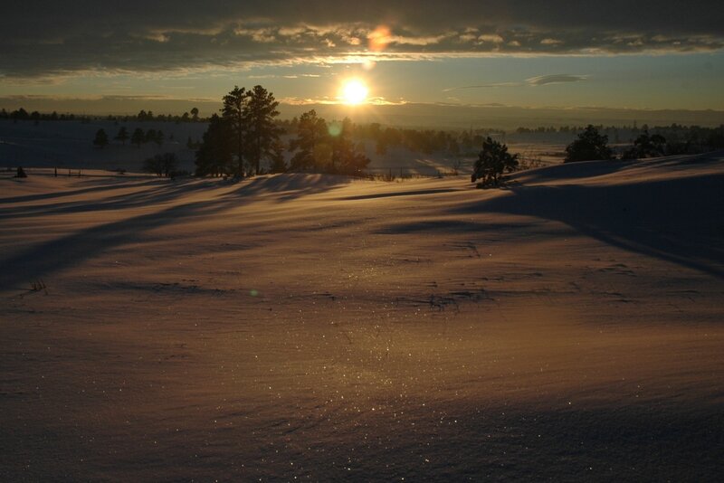 Snow-covered Hills at Sunset — Brown