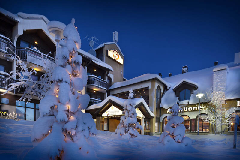 Snow-covered Hotel at Night