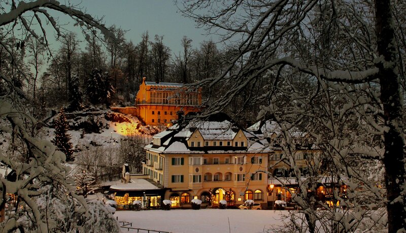 Snow-covered Hotel at Night — White