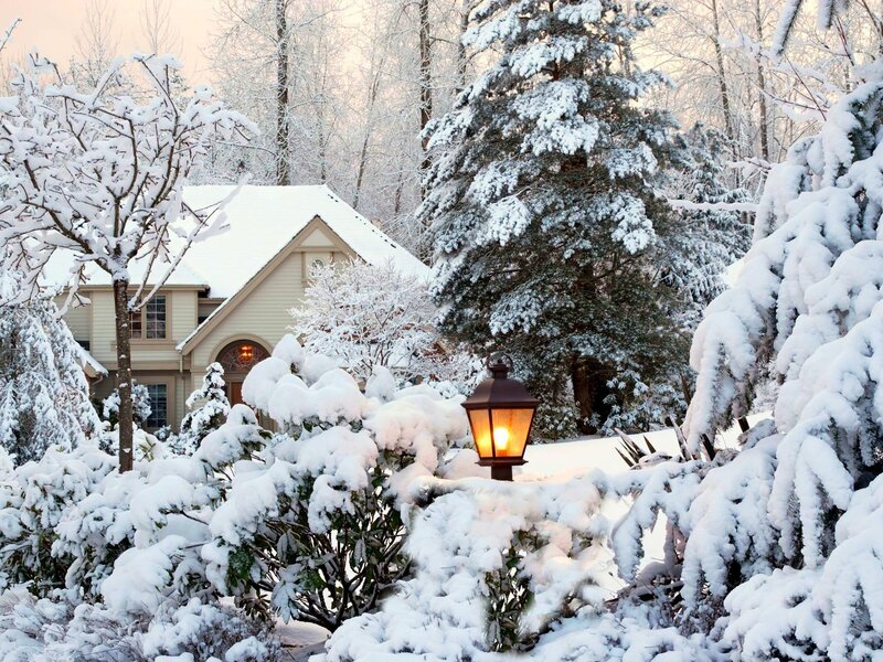 Snow-covered House and Lamp