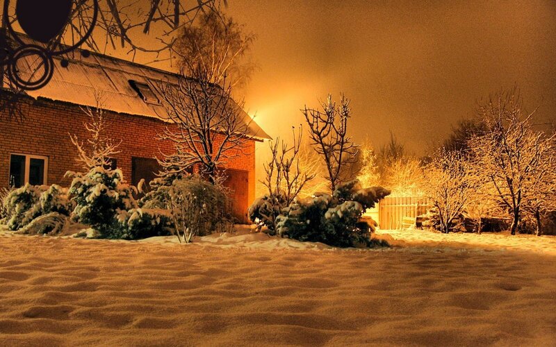 Snow-covered House at Night — Orange, Quiet