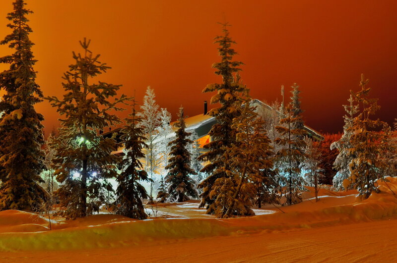 Snow-covered House at Night — Orange