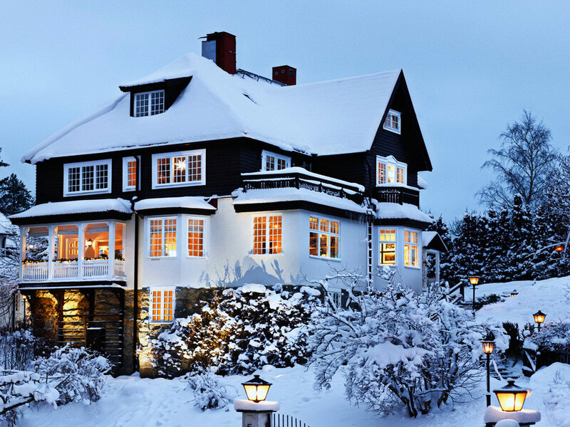 Snow-covered House at Night — White, Serene, Winter