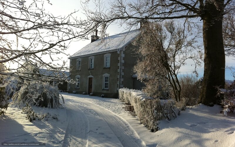 Snow-covered house in winter