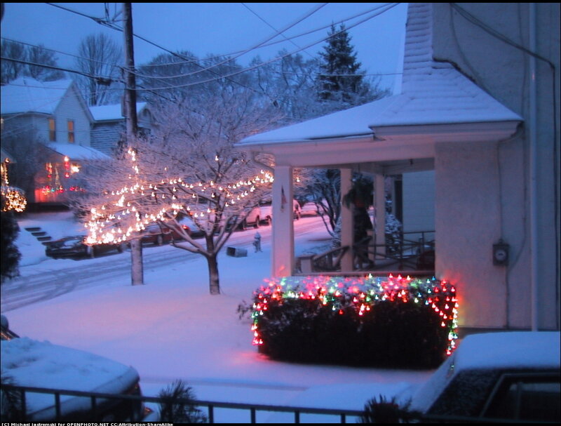 Snow-covered House with Lights
