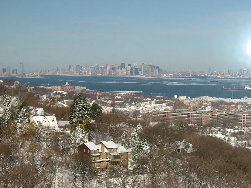 Snow-covered Houses and City