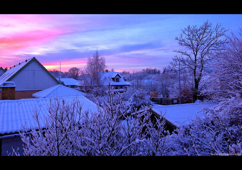 Snow-covered Houses at Dusk