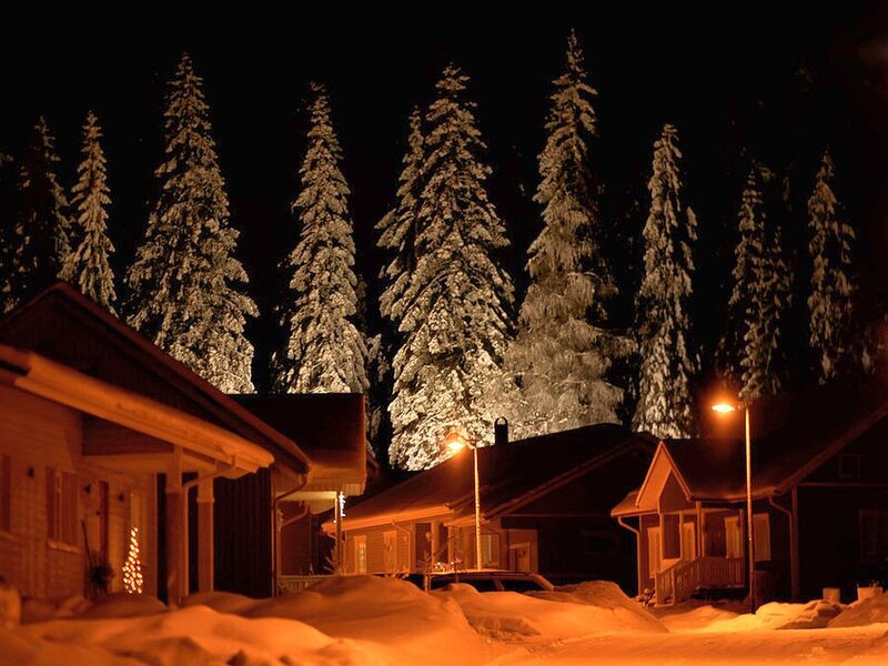 Snow-covered Houses at Night — Orange