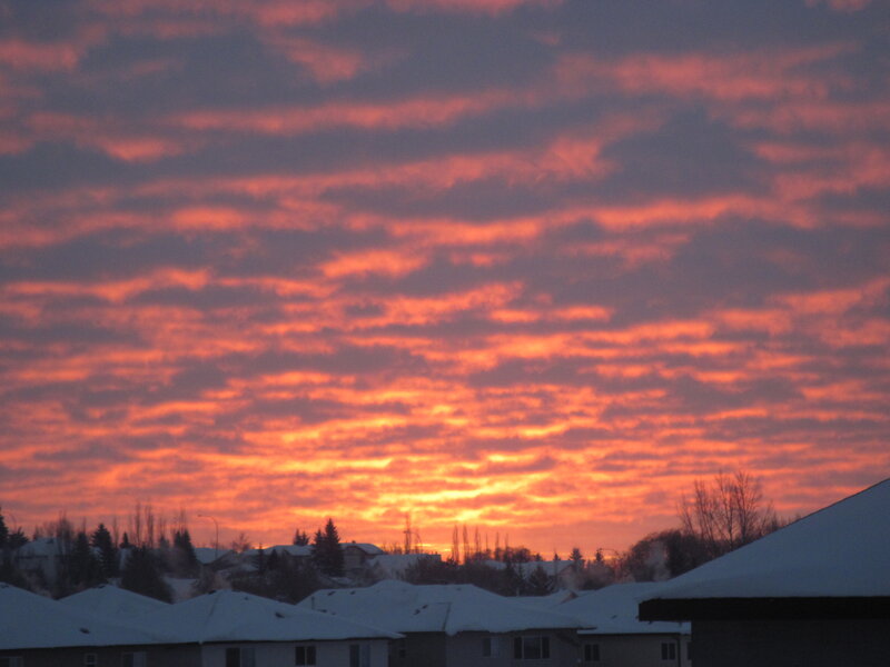 Snow-covered Houses at Sunset — Orange, Dramatic